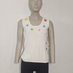 Joseph A. It is a knit garment distinguished by a floral and mirror design.